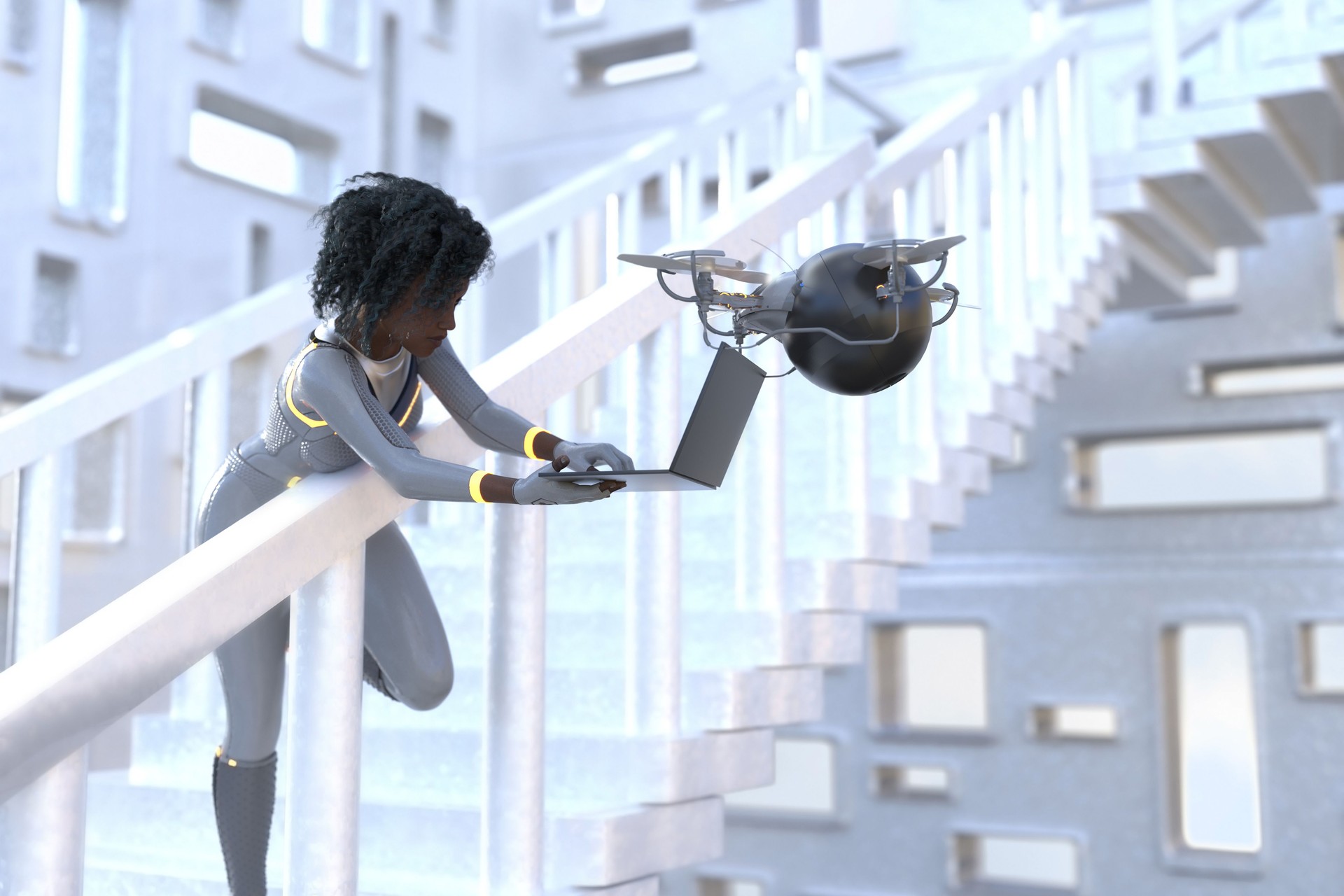 Une femme afro-américaine penchée par-dessus la rambarde de l’escalier pour taper quelque chose sur un ordinateur portable tenu par un drone flottant.